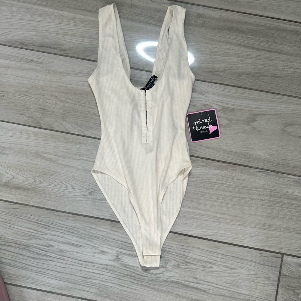 Cream Women’s One Piece Bodysuit NWT
